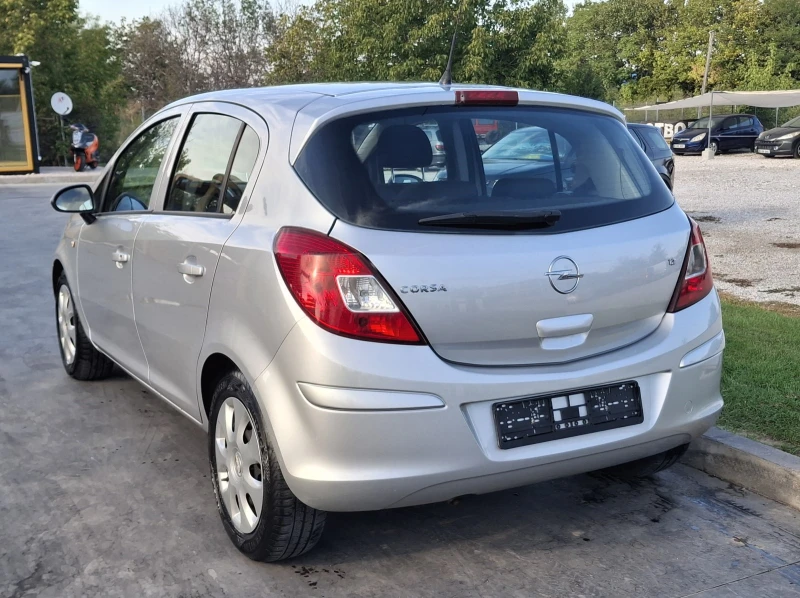 Opel Corsa Enjoy 1.2i 80PS, снимка 4 - Автомобили и джипове - 51646124