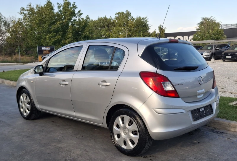 Opel Corsa Enjoy 1.2i 80PS, снимка 5 - Автомобили и джипове - 51646124