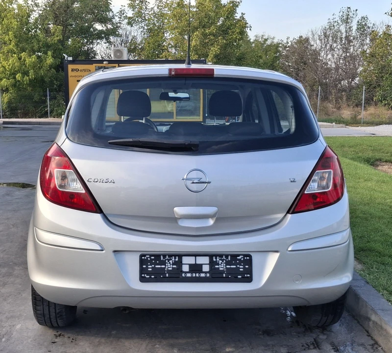 Opel Corsa Enjoy 1.2i 80PS, снимка 3 - Автомобили и джипове - 51646124