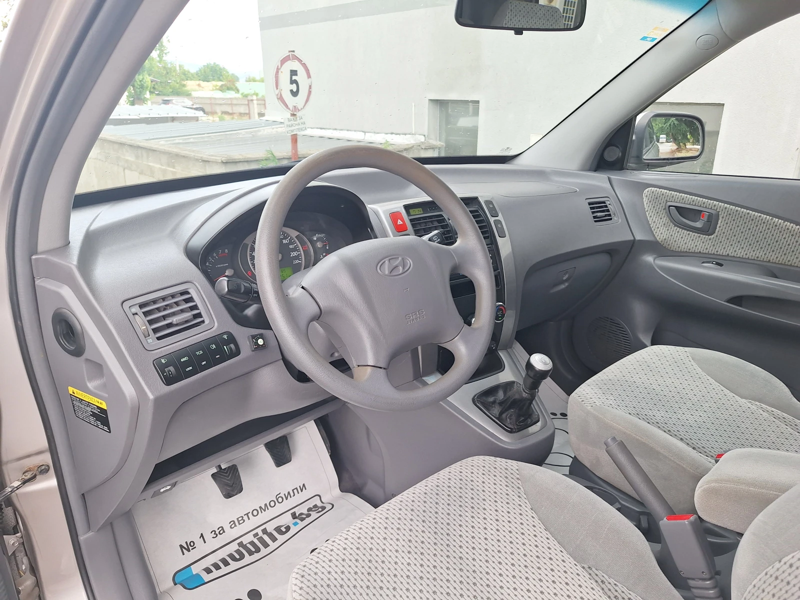 Hyundai Tucson 2.0i gaz 4x4, снимка 11 - Автомобили и джипове - 55148303