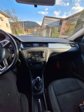 Skoda Rapid - 4750 € / 9290.19 лв. - 48558183 13