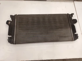 Кулер,интеркулер опел астра j 2.0 цдти