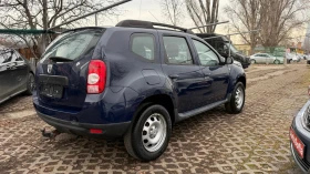 Dacia Duster 1.6 4x4 КЛИМА ЛУКСОЗНОТО ИЗПЪЛНЕНИЕ - LAUREATE, снимка 4