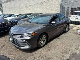������ Toyota Camry