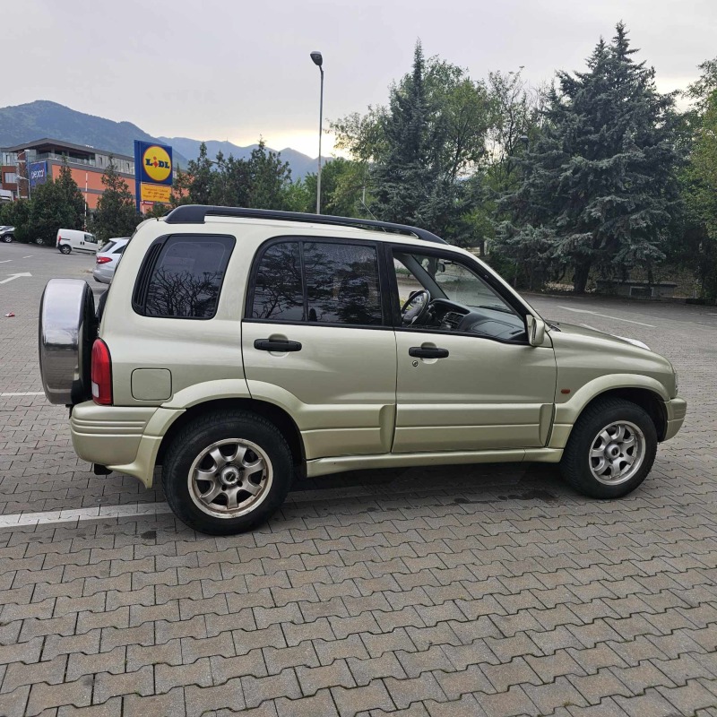 Suzuki Grand vitara, снимка 6 - Автомобили и джипове - 45322554
