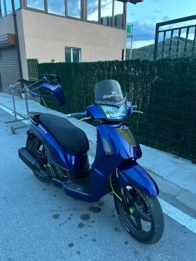 Kymco People, снимка 13