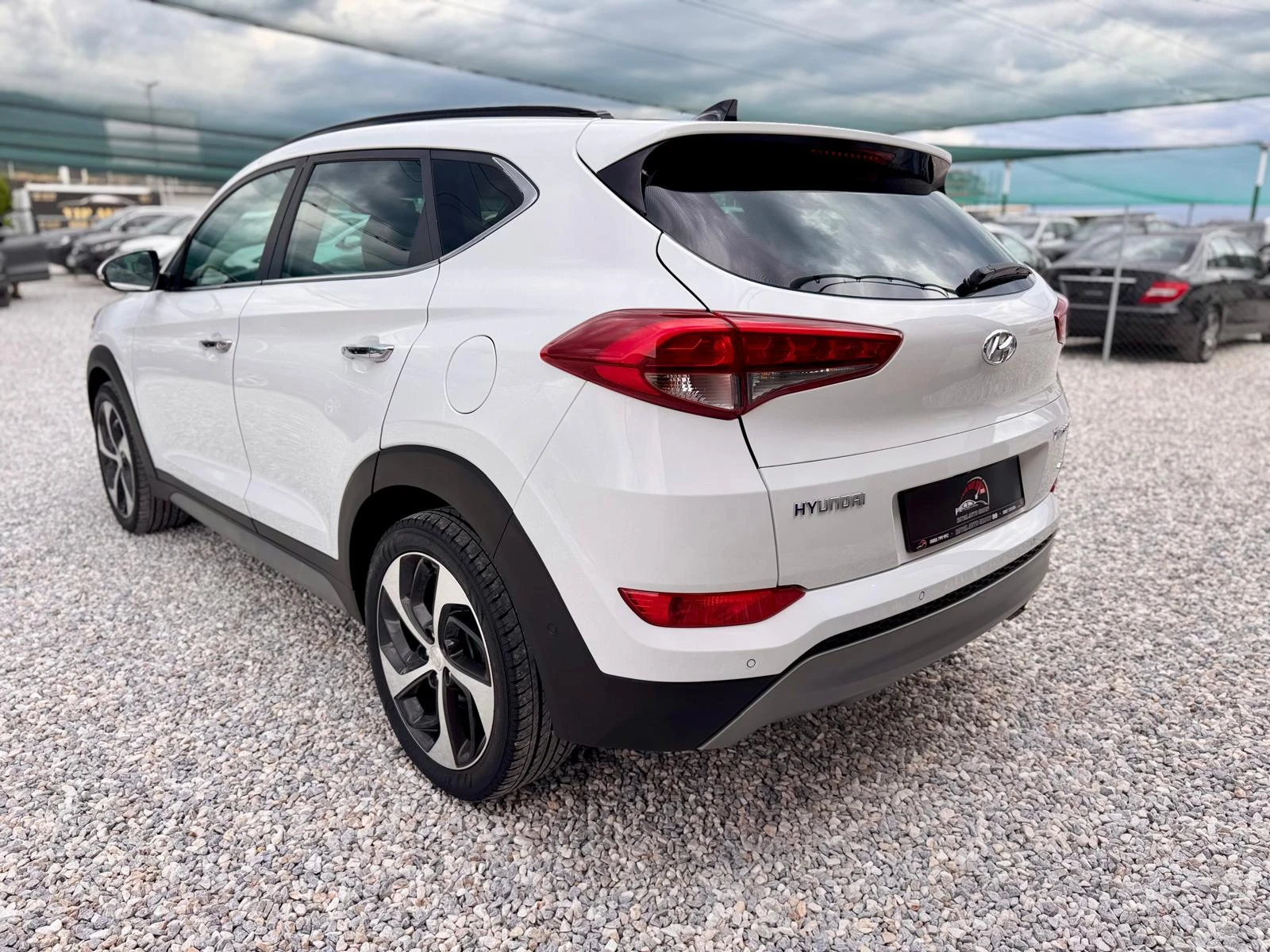 Hyundai Tucson 2.0CRDI::STYLE::4X4, снимка 6 - Автомобили и джипове - 55421845