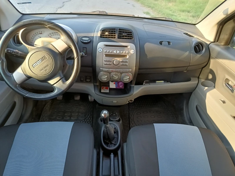 Daihatsu Sirion, снимка 12 - Автомобили и джипове - 47411798