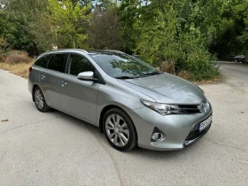 Toyota Auris 1.8 Hybrid 122х.км 2-кюча.Сервизна История.Нави, снимка 5