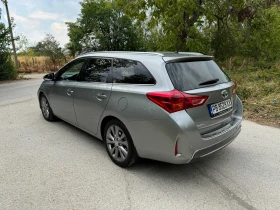 Toyota Auris 1.8 Hybrid 122х.км 2-кюча.Сервизна История.Нави, снимка 3