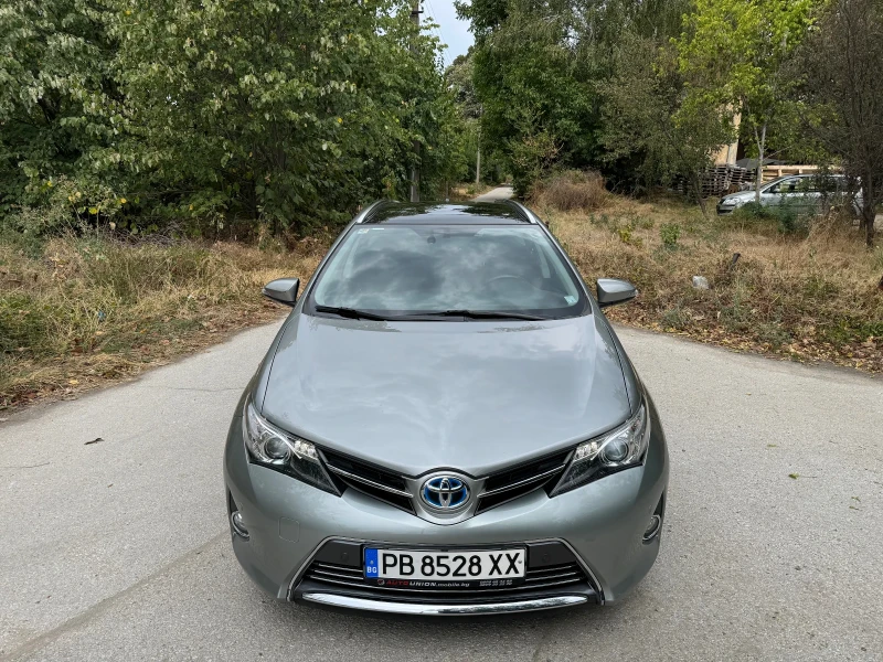 Toyota Auris 1.8 Hybrid 122х.км 2-кюча.Сервизна История.Нави, снимка 1 - Автомобили и джипове - 46960034