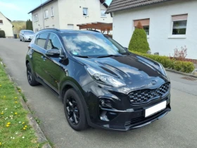 ������ Kia Sportage