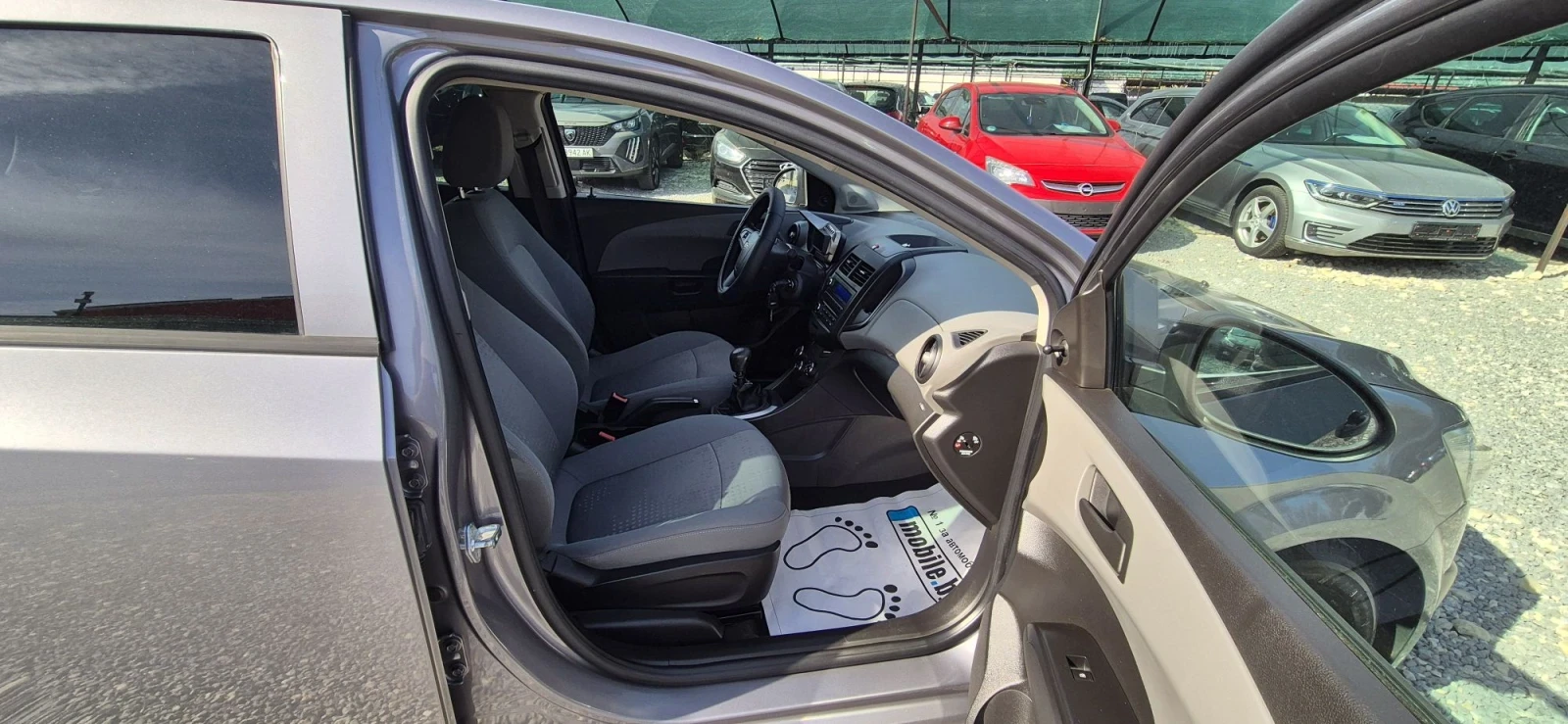 Chevrolet Aveo 1.3, снимка 15 - Автомобили и джипове - 56409264