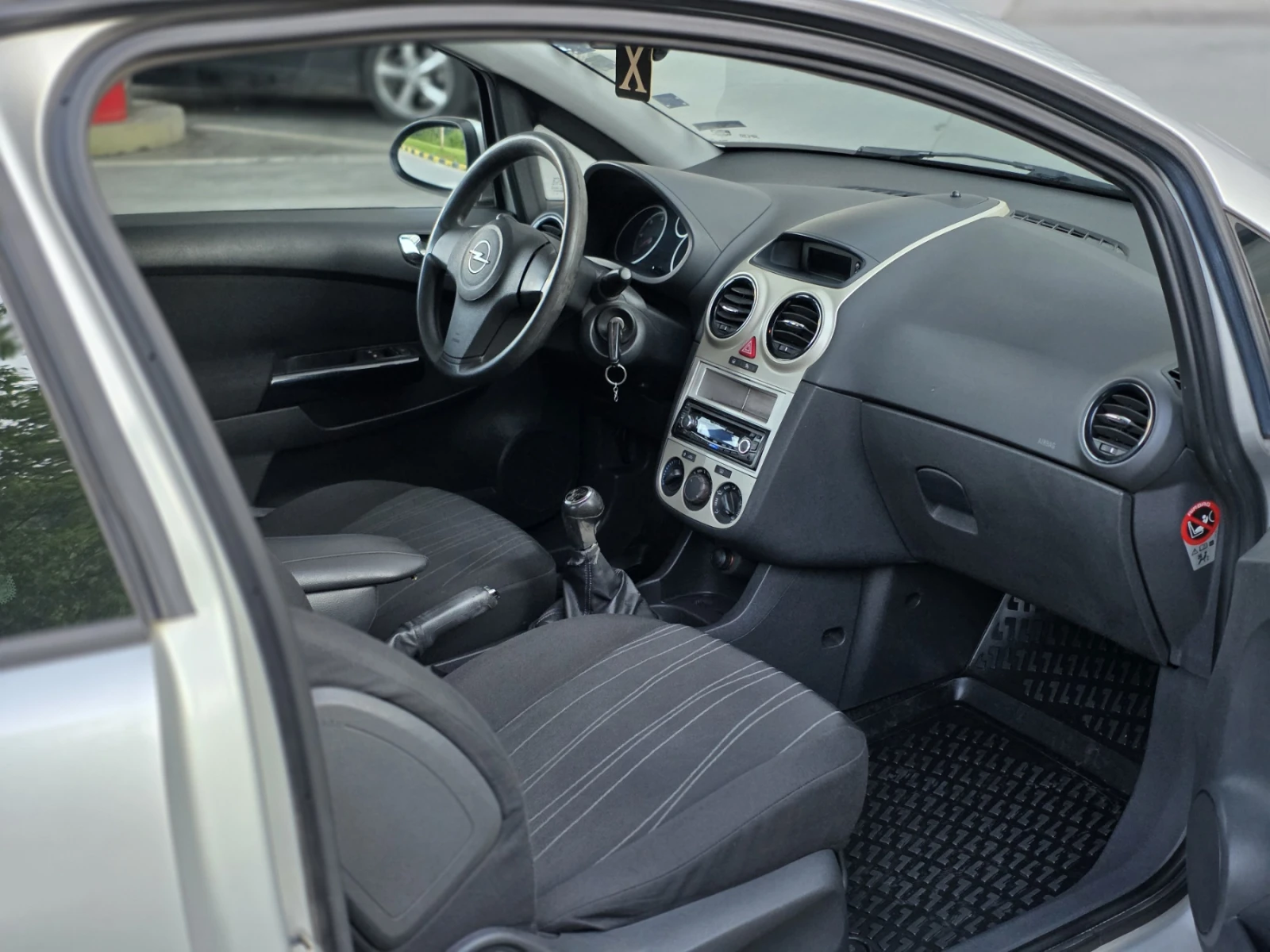 Opel Corsa 1.3 Mjet KLIMATIK/Euro 5, снимка 11 - Автомобили и джипове - 54770271