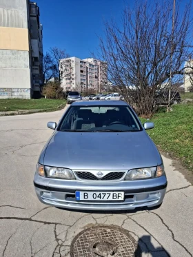 Nissan Almera 1.4 87 к.с., снимка 2