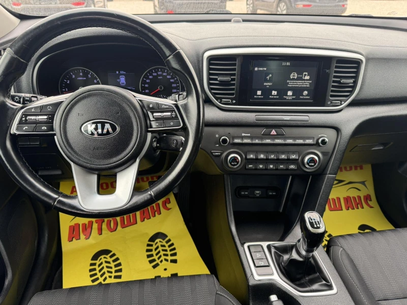 Kia Sportage 1.6I, снимка 10 - Автомобили и джипове - 52087847