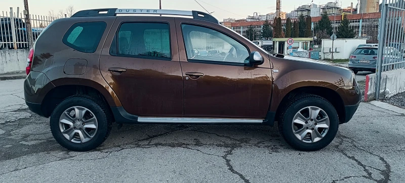 Dacia Duster 1.6i LPG Face, снимка 6 - Автомобили и джипове - 53455104