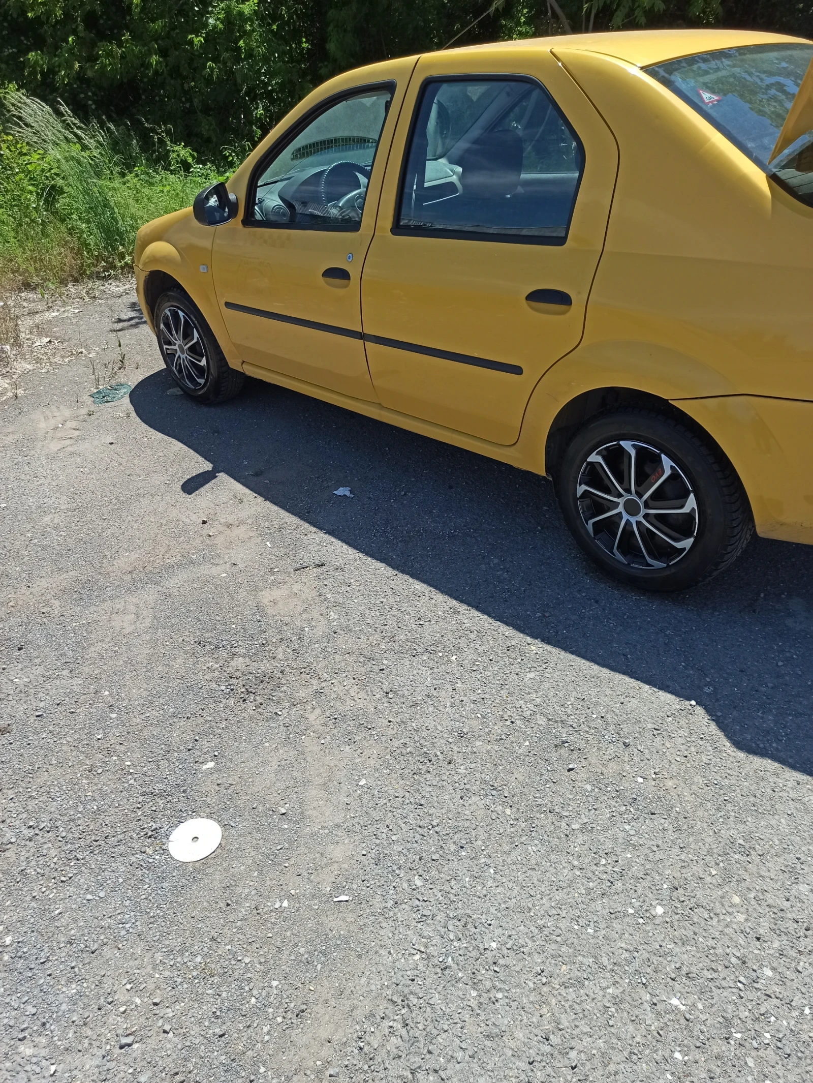 Dacia Logan, снимка 4 - Автомобили и джипове - 54910037