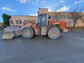 Челен товарач Hitachi 330, снимка 2