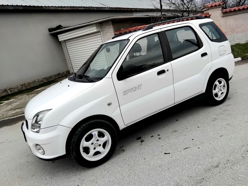 Subaru G3x justy 1.3ik.4+ 4, КЛИМАТИК. 2005г , снимка 10 - Автомобили и джипове - 53286541