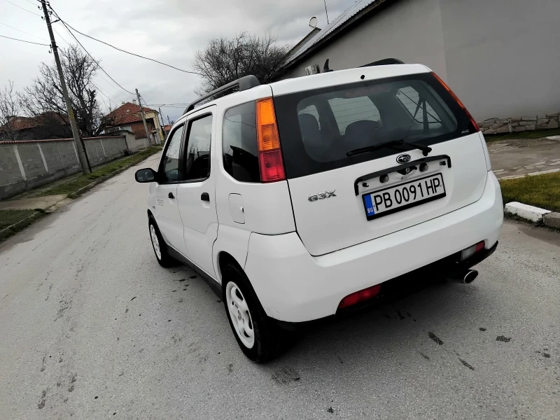 Subaru G3x justy 1.3ik.4+ 4, КЛИМАТИК. 2005г , снимка 13 - Автомобили и джипове - 53286541