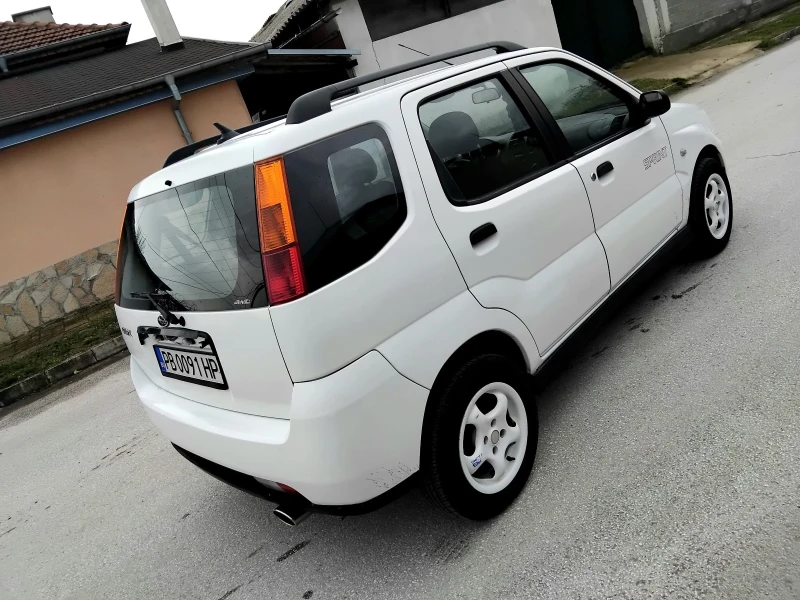 Subaru G3x justy 1.3ik.4+ 4, КЛИМАТИК. 2005г , снимка 5 - Автомобили и джипове - 53286541