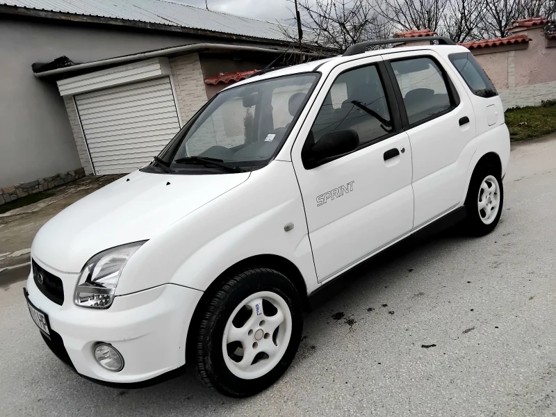Subaru G3x justy 1.3ik.4+ 4, КЛИМАТИК. 2005г , снимка 11 - Автомобили и джипове - 53286541