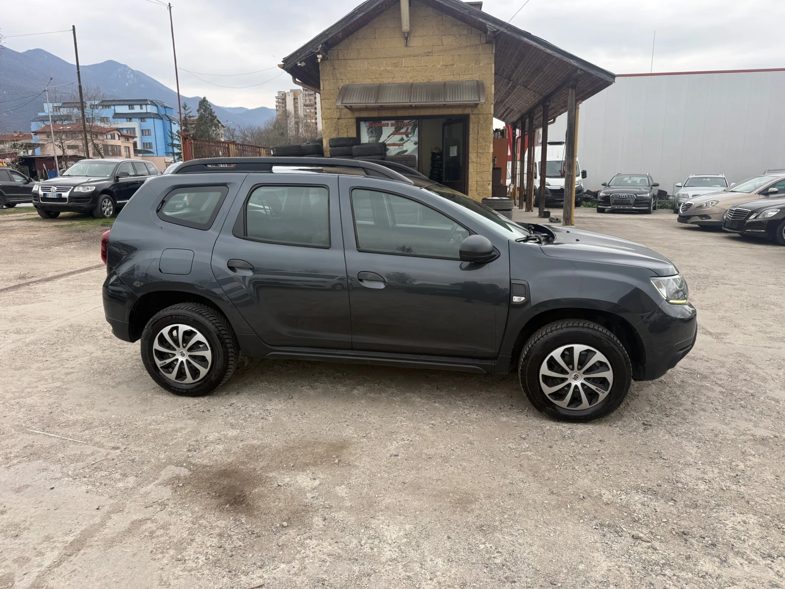 Dacia Duster 1.6i Газ заводска, снимка 7 - Автомобили и джипове - 54057209