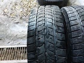 Гуми Зимни 215/65R15, снимка 3 - Гуми и джанти - 43635104