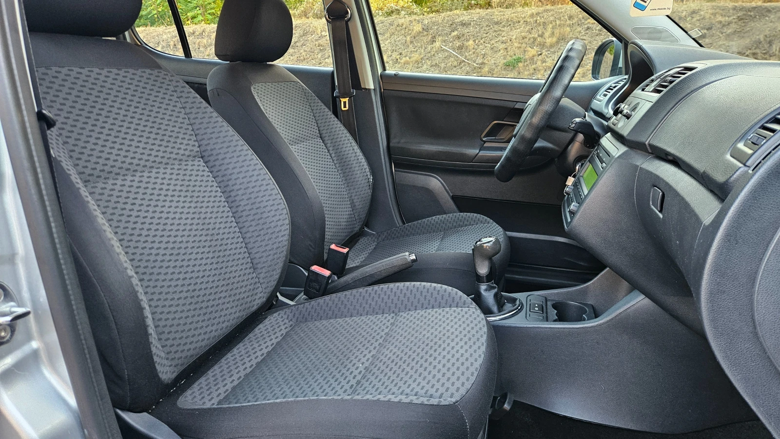 Skoda Fabia 1.2 FACELIFT/KLIMATIK/EURO-5B, снимка 13 - Автомобили и джипове - 56303193