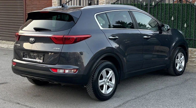 Kia Sportage 2.0 CRDI AWD EURO 6B, снимка 4 - Автомобили и джипове - 51994274