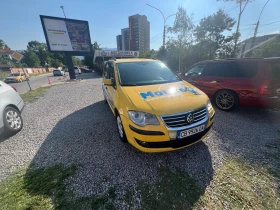 VW Touran 2.0 EcoFuel (метан/бензин), 109 к.с - 7 места, снимка 9