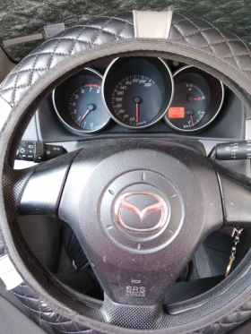 Mazda 3 1.4i, снимка 9