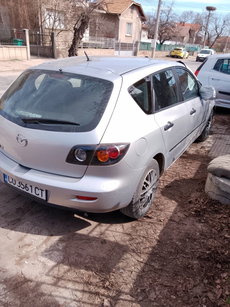 Mazda 3 1.4i, снимка 8 - Автомобили и джипове - 49421442