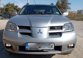 Mitsubishi Outlander 2.0 16v 136 к.с 4 wd АГУ , снимка 1