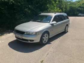 Opel Vectra CDX, снимка 1