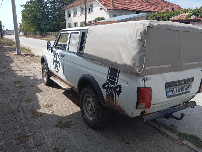 Lada Niva 1.7i, снимка 7 - Автомобили и джипове - 47411593