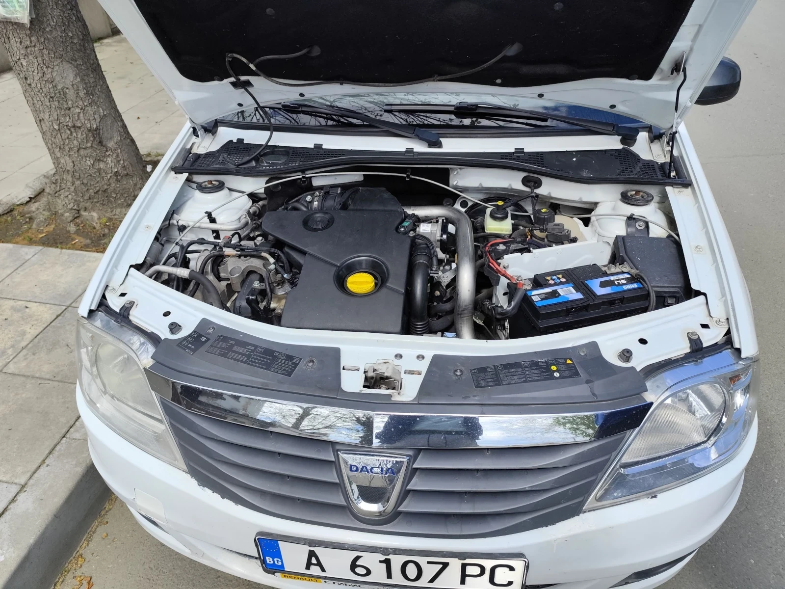 Dacia Logan, снимка 10 - Автомобили и джипове - 54308280