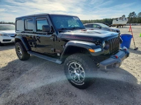 Jeep Wrangler UNLIMITED RUBICON* CARFAX * Клип на мотора - 26500 € / 51829.49 лв. - 36177521 5