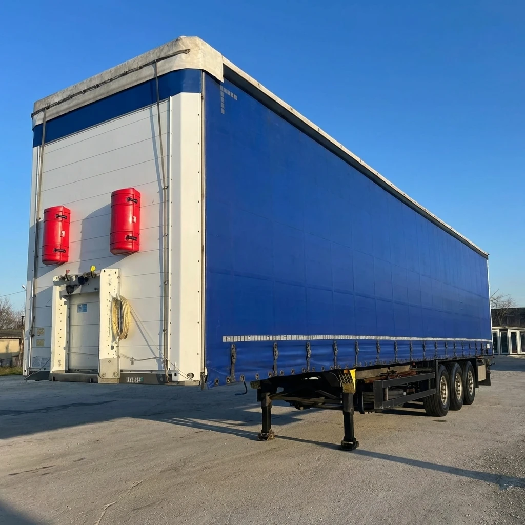 Полуремарке Schmitz ГОТОВО ЗА РАБОТА / НОВИ ГУМИ / НАПЪЛНО ОБСЛУЖЕН