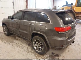 Jeep Grand cherokee OVERLAND* 5.7L* AWD* PANOROOF* CAMERA*  - 9000 € / 17602.47 лв. - 14111947 6