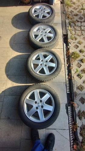 Гуми с джанти Continental 165/65R15, снимка 1 - Гуми и джанти - 47895042