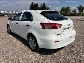 Mitsubishi Lancer 1.6 i Schweiz | Mobile.bg    3