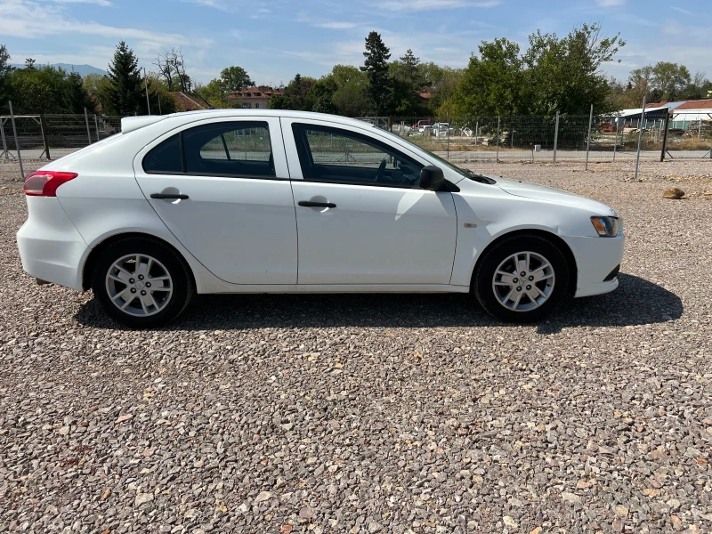 Mitsubishi Lancer 1.6 i Schweiz, снимка 5 - Автомобили и джипове - 51667834