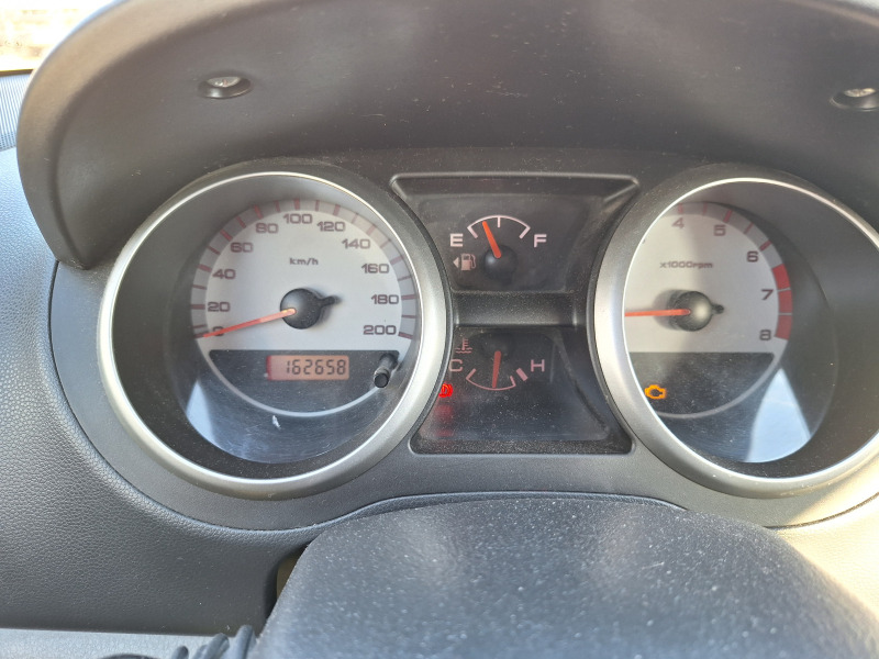 Suzuki Ignis Бензин/Газ, снимка 9 - Автомобили и джипове - 46176296