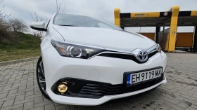 Toyota Auris 1.8 Hybrid(гаранционна)! | Auto.bg — изображение 2