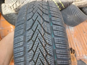 Гуми Зимни 215/60R16, снимка 1 - Гуми и джанти - 38091874