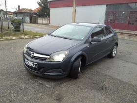 Opel Astra gtc, снимка 1