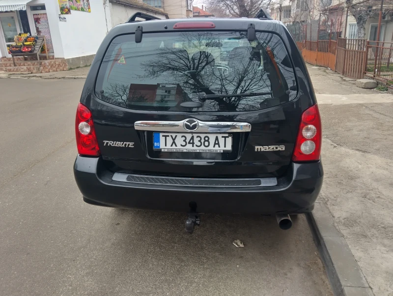 Mazda Tribute, снимка 9 - Автомобили и джипове - 49484508