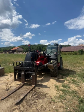Телескопичен товарач Manitou MT1335, снимка 1